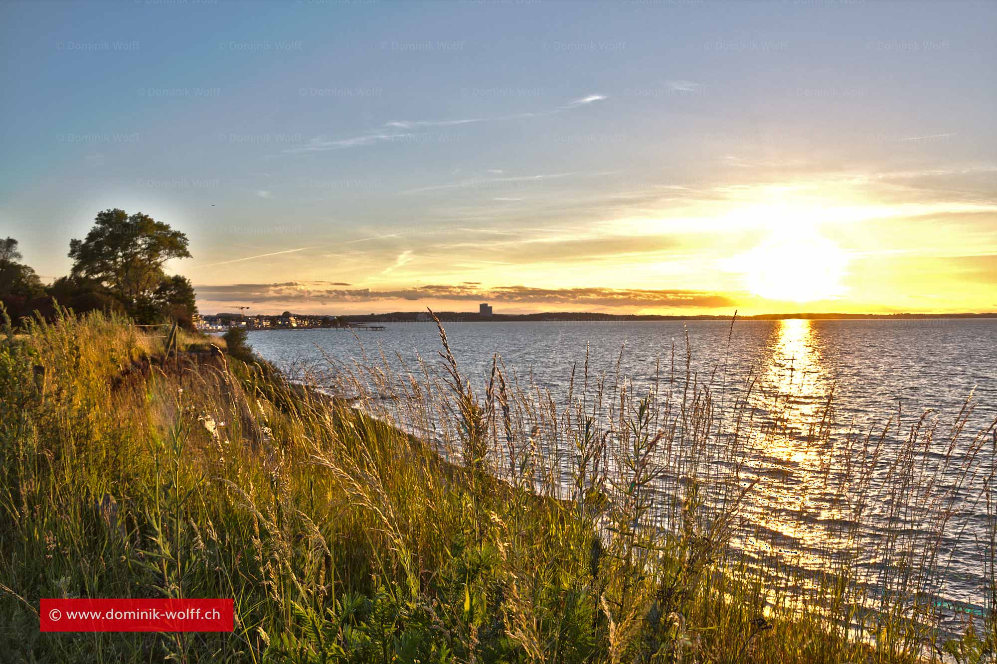 Bild + Foto - Sonnenuntergang hinter Timmendorfer Strand